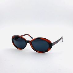 This is an authentic vintage deadstock 1990s made item with thick high quality frames and glass lenses that provide UV 400 protection as well. Has metal wire inside frame for durability. Cannot be found anywhere else as they have been discontinued 22 years ago. Extremely limited and rare.  |1990s Made Glasses || Glass Lens || High Quality Thick Frame || Vintage Item || One Of A Kind || Located In Santa Clarita California || I ship in glasses boxes, I send out packages from Santa Clarita CA using Retro Brown Oval Sunglasses, Retro Oval Brown Sunglasses, Santa Package, Santa Clarita California, Red Sunglasses, Santa Clarita, Small Faces, Have Metal, From Santa