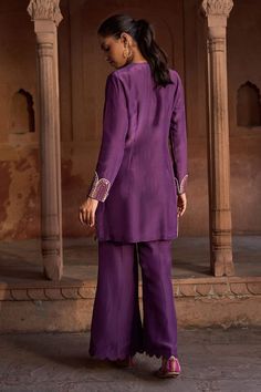 Purple full sleeves short kurta with persian mural embroidery using beads, cut dana, sequins highlights and dori tie-up neckline. Paired with an embellished border flared pant. - Aza Fashions Traditional Festive Pant Set With Set-in Sleeves, Traditional Kurta With Set-in Sleeves For Eid, Designer Long Sleeve Purple Palazzo Set, Festive Purple Palazzo Set With Long Sleeves, Purple Long Sleeve Palazzo Set For Festive Occasion, Festive Purple Long Sleeve Palazzo Set, Festive Long Sleeve Purple Palazzo Set, Elegant Long Sleeve Purple Palazzo Set, Elegant Purple Long Sleeve Palazzo Set