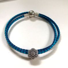 Pandora Blue Mix Leather Bracelet 41 Cm Or About 16” Long Comes With Pandora Ice Floral Charm Marked Pandora And S925 Ale Comes In A Gift Pouch Elegant Adjustable Blue Leather Bracelet, Elegant Blue Adjustable Leather Bracelet, Elegant Blue Leather Bracelet For Gift, Elegant Blue Leather Bracelets, Everyday Blue Leather Jewelry, Elegant Blue Leather Jewelry, Blue Leather Bracelet As Gift, Blue Leather Bracelet For Gifts, Blue Leather Bracelet As A Gift