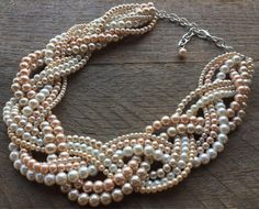 Champagne, Cream Ivory, Pink Champagne Statement Necklace, Chunky Pearl Necklace, Pearl Bridal Necklace on Silver or Gold Chain Necklace: 24 inches from end to end. Hooks between 20 and 24 inches. DISCOUNT: If you order 5 or more of the same type of item (ex: 5 or more bracelets) you will be refunded 10% of your order price after your order is placed. If you order 10 or more items of the same type, your refund will be even bigger at 15%! Expedited shipping available upon request. *Shipping Note: Chunky Pearl Necklace, Pink Statement Necklace, Diamond Bar Necklace, Chunky Pearls, Champagne Pink, Diamond Initial Necklace, Pearl Statement Necklace, Bridal Pearl Necklace, Gold Letter Necklace