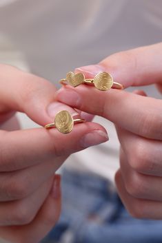 STANDARD ∙ SIGNET ∙ R I N G D E T A I L S A classic oval ring with your actual handwriting.   * Material: Sterling Silver, 14K Gold Filled , 14K Rose Gold Filled or 14K solid gold  (Gold Filled is made of thick 14k gold or rose gold layered on .925 sterling silver.) * Heart size: 8mm *  Circle size: 8mm * Oval size: 8x10mm PERSONALIZATION This ring can be customized with your actual fingerprint. Maximum 1 fingerprint ☛HOW TO SEND THE FINGERPRINT/HANDWRITING IMAGE: You can send us the picture of Minimalist Oval Signet Ring For Promise, Gold Stackable Promise Rings, Gold Oval Stackable Rings For Promise, Gold Oval Stackable Promise Rings, Minimalist Oval Engraved Promise Ring, Oval Heart Ring For Valentine's Day Promise, Personalized Oval Signet Ring For Promise, Oval Dainty Midi Rings For Gift, Dainty Oval Midi Rings For Gift