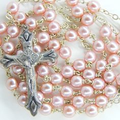 Vintage Virgin Mary Rosary with Pearl Pink Beads Embrace your faith with this exquisite vintage rosary. The light pink color beads are stunning and Virgin Mary centerpiece make it a meaningful piece for prayer and reflection. These beads are not authentic pearls. They are pink acrylic beads. Need guidance on how to pray the rosary? Simply request free digital instructions at checkout, and we'll gladly include them with your purchase. Rosary Details: Total Length: 20.5" Drop: 6"  Why Shop at Blessed Catholic? ✝ Serving the Etsy community since 2009 ✝ Secure packaging in a bubble mailer for safe arrival ✝ Fast, reliable USPS First Class shipping within the USA and internationally ✝ Thank you for choosing Blessed Catholic ✝ Feel free to adjust any of the details to better suit your needs! Handmade Pink Rosary With Round Beads, Pink Beaded Spiritual Rosary, Pink Rosary With 8mm Round Beads, Pink Beaded Rosary With Round Beads, Pink Rosary With Round Beads For First Communion, Pink Rosary For First Communion, Pink Beaded Rosary, Virgin Mary Rosary, Vintage Virgin Mary