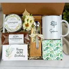 a gift box filled with coffee, tea and other items for someone's birthday