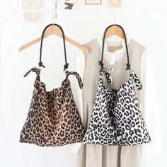 SPECIFICATIONS Brand Name: TAVIMART Types of bags: Shoulder & Handbags Main Material: POLYESTER Hardness: SOFT Pattern Type: LEOPARD Interior: Interior Zipper Pocket Occasion: Versatile Closure Type: hasp Number of Handles/Straps: Single main material: fabric 36(length)*34(height)cm Casual Brown Bag With Long Strap, Summer Shopping Crossbody Canvas Bag, Summer Crossbody Canvas Bag For Shopping, Travel Tote Bag With Long Strap, Casual Bag With Long Strap For Daily Use, Trendy Sling Bag With Single Shoulder Strap, Trendy Sling Bag For Daily Use, Summer Bags With Long Strap For Daily Use, Casual Tote Bag With Long Strap