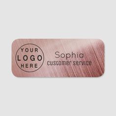 a pink metal sticker that says your logo here