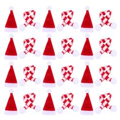 many red and white hats are arranged in the shape of santa claus's hat