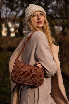 This ginger color saddle bag Loran is made of polyester cord with with leather sidewall, strap and zipper on the leather. Closes with zipper on the leather.  Dimensions: ✶ Length 28 cm ✶ Width 17 cm ✶ Depth 6 cm ✶ Shoulder strap - 63-73 cm You can order this bag in the colors of your choice. I will choose the color of the cord for the color of the leather set. The term of making a bag to order is 7-14 days Brown Straw Shoulder Bag For On-the-go, Light Brown Woven Shoulder Bag For Travel, Travel-friendly Woven Light Brown Shoulder Bag, Travel Light Brown Woven Shoulder Bag, Brown Hobo Bag With Braided Handles For On-the-go, Brown Saddle Bag With Adjustable Strap For Outdoor, Travel Shoulder Bag With Braided Handles In Light Brown, On-the-go Woven Satchel Shoulder Bag, Light Brown Travel Shoulder Bag With Braided Handles