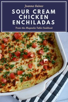 an enchilada with tomatoes and parsley in a casserole dish