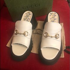 Gucci Dusty White Leather Sandals With Lug Sole And Gold Horsebit Embellishment. With 3 1/4 Inch Heel And 1 1/4 Inch Platform These Shoes Are Comfortable And Stylish. Comes With Dust Bag Box And Tags Full Set. Currently In Stores For $900 Summer Formal Gucci Mules, Gucci Formal Summer Mules, Gucci High Heel Mules With Branded Heel Counter, Gucci Designer High Heel Mules, Gucci Elegant High Heel Mules, Elegant Gucci High Heel Mules, Gucci Open Heel Mules For Formal Occasions, Gucci Formal Open Heel Mules, Gucci Open Toe Mules For Formal Occasions