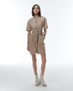 Effortlessly combine style and functionality with the Thallo Safari Dress. This military-inspired design features front pocket details and shoulder straps, while the included belt cinches in at the waist for a flattering silhouette. Whether you're exploring the city or embarking on a safari adventure, this dress will keep you comfortable and chic. Materials 97% Cotton 3% Elastane Direct Shipment from USA. Dry Clean Only Miranda Priestly, Safari Dress, Safari Adventure, Breezy Dress, Gifts For New Mums, Fashion Group, Blazer With Jeans, Pearl Jewellery Earrings, Military Inspired