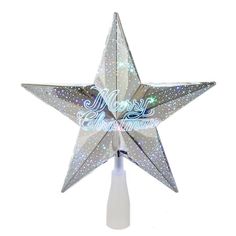 a white christmas tree topper with a silver star on it's side and the words merry christmas written below