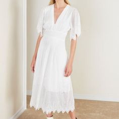 Crafted From A Natural Fiber Cotton Crepe, The Elise Long Dress Features Magali Pascal Signature Cutwork Embroidery Throughout The Full-Length Skirt And Sleeves. The Dress Is Designed With Pleated Details At The Waist And Shoulders And Is Cut With A Delicate Scallop Hem. Lined. Long Length Pleated Details Around The Waist Embroidery Around The Skirt And Sleeves Scallop Hem The Model Is 180cm Tall (5’9) And Is Wearing A Size S 10 (Au) / 38 (Fr) / 6 (Us) / 10 (Uk) Her Measurements Are As Follows: V-neck Lace Dress With Broderie Anglaise, Elegant Broderie Anglaise Maxi Midi Dress, Elegant Maxi Dress With Broderie Anglaise For Spring, Elegant Maxi Dress With Broderie Anglaise For Summer, Elegant Spring Maxi Dress With Broderie Anglaise, Elegant White Midi Dress With Cutwork Hem, Elegant Summer Maxi Dress With Broderie Anglaise, Elegant Broderie Anglaise Maxi Dress For Spring, Elegant Broderie Anglaise Midi Dress For Beach