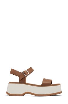 A chunky platform elevates a retro-cool sandal secured with an adjustable strap at the ankle. 2 1/4" heel, 2" platform; 1/4" slope (size 8.5) Cushioned footbed Leather upper/synthetic lining/rubber sole Imported Adjustable Platform Footbed Sandals With Round Toe, Adjustable Platform Sandals With Round Toe, Spring Brown Sport Sandals With Adjustable Strap, Modern Platform Footbed Sandals For Spring, Brown Sport Sandals With Adjustable Strap For Spring, Modern Spring Platform Footbed Sandals, Modern Sport Sandals With Heel Strap For Spring, Spring Ankle Strap Platform Footbed Sandals, Spring Footbed Sandals With Heel Strap And Round Toe