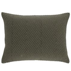 a black and white chevroned pillow on a white background with an arrow pattern