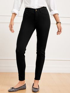 The softness of our leggings meets the polish of our skinny leg. Crafted from our easy, comfort stretch denim, these versatile, black-colored jeggings are designed with our exclusive slimming panel. Curvy Fit is specially designed for the woman whose waist is proportionately smaller than her hips. For a classic fit, check out our Denim Jegging- Black. features Curvy Fit flatters an hourglass figure from waist to thigh Ankle length Skinny leg High waist Fly front with button closure Imported Fit: Versatile Straight Leg Jeggings For Everyday, Versatile Black Stretch Jeans, Black Mid-rise Jeans For Business Casual, Black Stretch Versatile Jeans, Versatile Stretch Jeans With Tapered Leg, Chic Straight Leg Jeggings, Chic Straight Leg Jeggings For Everyday, Chic Everyday Straight Leg Jeggings, Chic Stretch Jeggings For Everyday