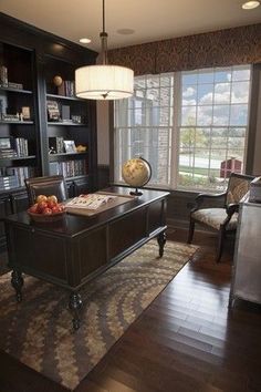 a living room filled with furniture and bookshelves