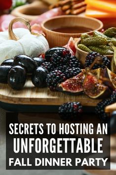 a table full of fruits and vegetables with the words secrets to hosting an unforgettable fall dinner party