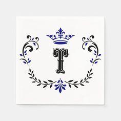 the letter f with a crown on top of it in blue and white paper napkins