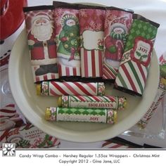 candy bar wrappers on a plate with christmas decorations