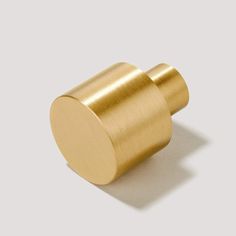 an image of a brass knob on a white background