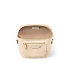 LOUIS VUITTON® - Mini Bumbag - Cream Beige Travel Bag With Coin Pocket, Luxury Crossbody Shoulder Bag With Coin Pocket, Luxury Bags With Coin Pocket For Travel, Luxury Travel Bag With Coin Pocket, Bumbag Louis Vuitton, Louis Vuitton Mini, Leather Tag, Monogram Pattern, Louis Vuitton Official