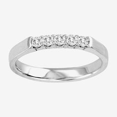 Make a simply sparkling statement with this lovely 14K white gold classic band featuring 1/4 ct. t.w. round diamonds.Stones: 1/4 ct. t.w. round diamondsRing Style: Bands, Wedding Bands, 5-Stone Rings, Anniversary BandsDiamond Clarity: I1-I2Stone Cut: RoundDiamond Color: H-IMetal Color: WhiteRounded Carat Weight: 1/4 Ct. T.w.Care: Wipe CleanAuthenticity: Natural DiamondMetal: 14k GoldCountry of Origin: Imported Diamond Stackable Rings With Channel Set Round Cut, Classic Diamond Stackable Rings Channel Set, Classic Diamond Channel Set Stackable Rings, Minimalist White Gold Diamond Ring Channel Set, Minimalist White Gold Diamond Ring With Channel Set, 14k White Gold Stackable Rings With Brilliant Cut, Classic White Gold Stackable Rings With Brilliant Cut, Minimalist Channel Set White Gold Diamond Ring, Classic White Gold Stackable Rings With Channel Set