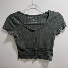 Aeropostale Olive Green Ribbed Henly Type Lace Cropped Blouse In Size ( Xsmall ) Would Fit A Small Since It Has Stretch,Front Buttons,Lace Hem Line Details,Stretchy,Ribbed Style,Perfect For Everyday Wear Trendy New No Tags Casual Fitted Crop Top With Lace Trim, Casual Short Sleeve Crop Top With Lace Trim, Impulsive Ideas, Cropped Blouse, Fire Fits, Lace Hem, Crop Blouse, Aeropostale, Olive Green