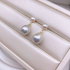 Uniquely shaped Baroque pearl stands as an emblem of your irreplaceable individuality. Set with a pair of flattened round small pearls to add a sense of young and fashion. They perfectly symbolize that you're not one to settle for the ordinary. Pearl Type: Freshwater Pearls Pearl Quality: [Shape]: Baroque & Flattened Round [Pearl Size]: 11mm Baroque, 5.5-6mm Round Pearl [Blemish]: Minimal [Luster]: Extremely High Metal material: 14k Gold-Filled Minimalist Baroque Pearl Earrings In Pearl White, Pear-shaped Akoya Pearl Earrings With Pearl Charm, White Pear-shaped Pearl Pendant Earrings, Baroque Pearl White Pearl Earrings For Anniversary, White Pear-shaped Pearl Earrings With Pendant, Minimalist Baroque Pearl White Pearl Earrings, White Akoya Pearl Earrings In Pear Shape, Pear Shaped Pearl Pendant Earrings In White Gold, Pear-shaped Pearl Pendant Earrings In White Gold