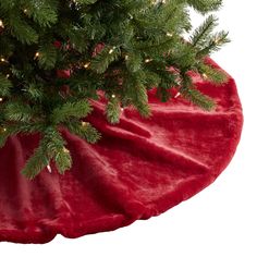 a christmas tree skirt with lights on it