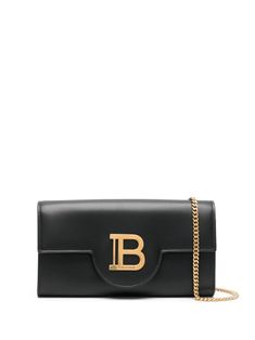 Elevate your accessorizing game with this Balmain Buzz Wallet Designed for the modern woman of FW24 Made from luxurious and durable calf leather Lined with soft and smooth lambskin Complete with a stylish chain for added flair The perfect small leather good for any outfit or occasion Upgrade your accessories collection with this versatile piece Balmain Bag, Wallet On Chain, Black Leather Wallet, Mini Wallet, Wallet Chain, Logo Stamp, Small Leather Goods, Jet Black, Valentino Garavani