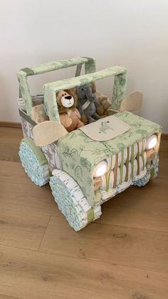 a stuffed animal in the back of a jeep with its lights on and teddy bear inside