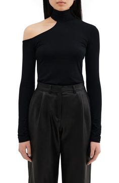 This close-fitting turtleneck top is designed with an edgy neckline cutout for day-to-night appeal. Turtleneck Long sleeves 96% Tencel® lyocell, 4% elastane Tencel lyocell is a more-sustainably produced fiber made with closed-loop processing Machine wash, line dry Imported Modern Mock Neck Top For Fall, Elegant Turtleneck Top For Night Out, Chic Black Long Sleeve Top, Solid Turtleneck Tops For Night Out, Modern Elastane Tops For Party, Modern Elastane Party Tops, Elegant Stretch Mock Neck Top For Night Out, Chic Fitted Mock Neck Top For Night Out, High Neck Elastane Tops For Night Out