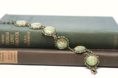 Olive Green Flower Glass and Antiqued Bronze Bracelet £15.00 Green Flower, Green Flowers