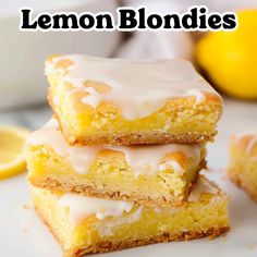 three lemon blondies stacked on top of each other with the words lemon blondies above them