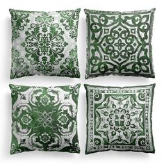 four pillows with green and white designs on the front, one has a square design