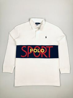 This shirt's logo is from Ralph Lauren's athletic-themed Spring 1991 collection, which featured "Polo Sport" branding prior to the official launch of Polo Sport.   DETAILS Classic Fit: Polo Ralph Lauren's roomiest silhouette. Cut for a lower armhole and a fuller sleeve that falls closer to the elbow. Twill rugby collar. Three-button placket. Rubber buttons. Long sleeves with ribbed cuffs. Archival "Polo Sport" logo printed at the center chest. Even vented hem. Signature embroidered Pony at the l White Fitted T-shirt With Embroidered Logo, Letter Print Polo Shirt For Streetwear, Sporty Fitted Polo Shirt With Graphic Print, Fitted Sporty Polo Shirt With Graphic Print, Sporty Polo Shirt For Sports Season, Sporty Polo Shirt With Letter Print, Cotton Polo Shirt With Graphic Print For Sports Season, Sporty Collared Polo Shirt With Letter Print, White Polo Collar Top For Sports Season