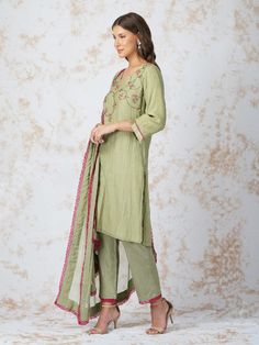 V-neck straight kurta is embellished with contrasting pink beadwork. It is paired with sequins highlighted dupatta and glace cotton pants. Color: Sage Green Fabric: Chanderi, Gerogette and glace cotton Note: Wash Care - Dry Clean only The product will be delivered within 3-4 weeks of order placed Relaxed Fit Smart Clothing, Zardozi Work, Smart Outfit, Street Smart, Straight Kurta, How To Hem Pants, Lace Hem, Indian Designer, Kurta Set