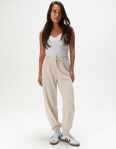 Rip Curl High Tide Fleece Joggers. Made From A High-Quality Cotton Fleece Peach Fabric, These Pants Offer Ultimate Comfort With A Relaxed Fit And An Adjustable Draw Cord. Featuring Contrasting Print, These Track Pants Are Perfect For Any Casual Occasion. You Can Also Pair Them With Our Matching Fleece Tops To Complete Your Look. Elastic Waistband And Cuffs. Fleece Lining. 55% Cotton 45% Polyester. Machine Wash. Imported. Model Is Wearing A Size Small. Model Measurements:height: 5'7" Bust: 34"waist: 25"hips: 34.5" Overalls Boys, Chino Pants Women, Wwe T Shirts, Flannel Sweatshirt, Peach Fabric, Girls Graphic Tee, Girls Blouse, High Tide, Fleece Joggers