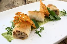 a white plate topped with food on top of a wooden table