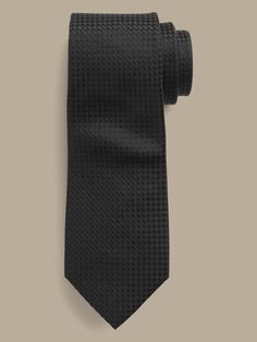 An unequivocally elevated tie, crafted from luxurious, soft silk with a varied texture.  Hand-pressed and shaped for a clean finish.  Measures 3" at widest point.  Length: 58" (147cm) Luxury Ties For Work, Luxury Ties For Office Suit Accessories, Modern Standard Tie For Office, Luxury Ties For Workwear, Luxury Standard Tie For Work, Luxury Business Neckwear, Standard Tie, Luxury Business Neckwear Standard Tie, Luxury Standard Tie For Business, Luxury Tie For Workwear