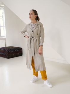 "Our linen clothes are handcrafted in our small studio with 4 passionate artisans. Unlike other brands, we do not ship hundreds of orders each day and are able to put human energy and warmth in every item we make. We try memorizing all our customers by heart and we truly hope that you feel it and are very grateful for your support. DESCRIPTION *Style No: PA-11 *Length a bit lower the knee *The collar has shawl lapels *Classic raincoat silhouette *Closes with button line * Fastens with belt * Sli Vintage Linen Outerwear For Fall, Vintage Linen Outerwear For Work, Long Linen Outerwear For Fall, Single Breasted Linen Long Coat, Single-breasted Long Linen Coat, Classic Raincoat, Linen Trench Coat, Linen Duster, Human Energy