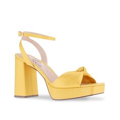 Nina-Seline Platform Sandal Summer fashion doesn't have to be difficult when you've got the N by Nina Selina platform sandal. A bow-tie toe strap gives a feminine touch to the adjustable sandal, elevated by a matching block heel. A neatly cut square toe brings an edgy finish. Hoco Shoes, Special Occasion Shoes, Yellow Sandals, Yellow Heels, Sandals Outfit, Trending Sneakers, Open Toe Shoes, Shoe Carnival, Athletic Fashion