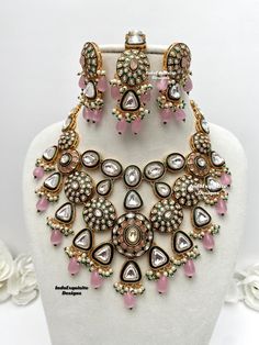 Premium quality elegant meenakari Kundan necklace comes with exclusive Earrings and Tikka/ Indian Jewelry/Premium Quality Polki and Kundan Jewelry/pink  All items are shipped from Brampton, Ontario, Canada. If you need your item by a certain day, please reach out to us for express delivery option before placing the order so that we can update the shipping for you. Standard shipping/delivery timeline Below are the delivery timeline estimates. We dispatch all orders by the next business day. ---> Pink Kundan Necklace For Festivals, Pink Intricate Design Necklace For Wedding, Pink Wedding Necklaces With Intricate Design, Heavy Pink Bridal Necklace For Wedding, Pink Kundan Jewelry Sets, Pink Chandbali Kundan Necklace For Wedding, Heavy Pink Kundan Necklace For Wedding, Pink Meenakari Necklaces For Festivals, Pink Meenakari Necklace For Festivals