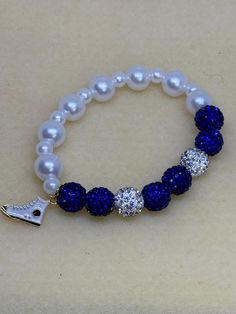 blue and white beaded pearl  bracelet with chucks charm Columbia Sc, Oct 1, White Beads, Pearl Bracelet, Favorite Jewelry, Columbia, Jewelry Bracelets, Accessory Gift, Beaded Bracelets