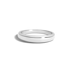 a white gold wedding ring on a white background