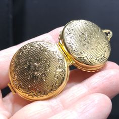 *Description: This is an unsigned Coro locket with a patent by Edwin S. Donle from the 1950s. The locket has four panels which include the front and back. The clasp is under the bail and when opened the two inner sections fit together like a clam shell. Each side could hold a photo and it is possible that two additional photos could be added. The design allows for many possibilities. I tested the surface for 10K gold and it tested as gold filled or gold plated. It is only marked with the patent Classic Vintage Charm Locket Necklace Collectible, Collectible Hallmarked Round Pocket Watch, Victorian Pocket Watch For Anniversary, Heirloom Gold Pocket Watch As Gift, Collectible Yellow Gold Pocket Watch With Locket, Classic Antique Gold Locket Necklace With Vintage Charm, Vintage Hallmarked Yellow Gold Pocket Watch, Antique Gold Pocket Watch With Locket For Formal Occasions, Antique Gold Locket Pocket Watch For Formal Occasions