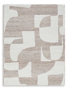 a beige and white rug with an abstract design