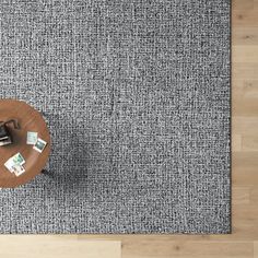 an overhead view of a coffee table with money on it