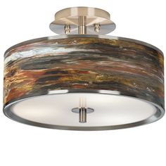 a semi flush light fixture with an abstract design