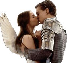 a man and woman in armor kissing each other